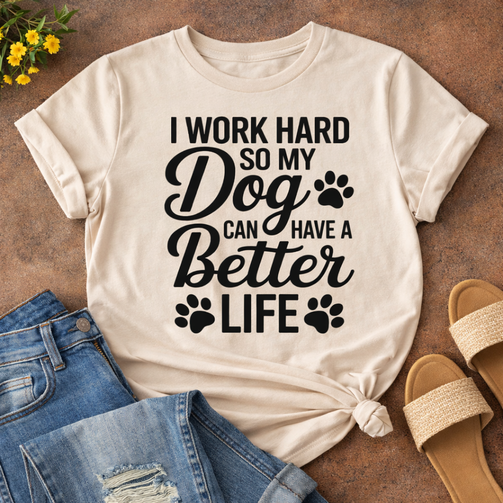 Funny dog mom quote “I Work Hard So My Dog Can Have a Better Life” SVG design on beige T-shirt mockup with jeans and sandals, Cricut dog lover shirt idea