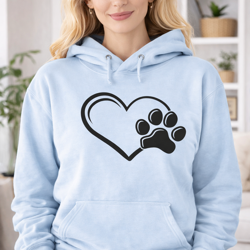 Dog paw print heart SVG design on a blue hoodie, featuring a simple heart outline with a paw print, ideal for Cricut DIY apparel projects