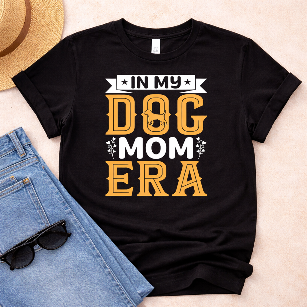 Black T-shirt mockup with In My Dog Mom Era SVG design, retro dog mom quote print with bold typography, styled with jeans on neutral background