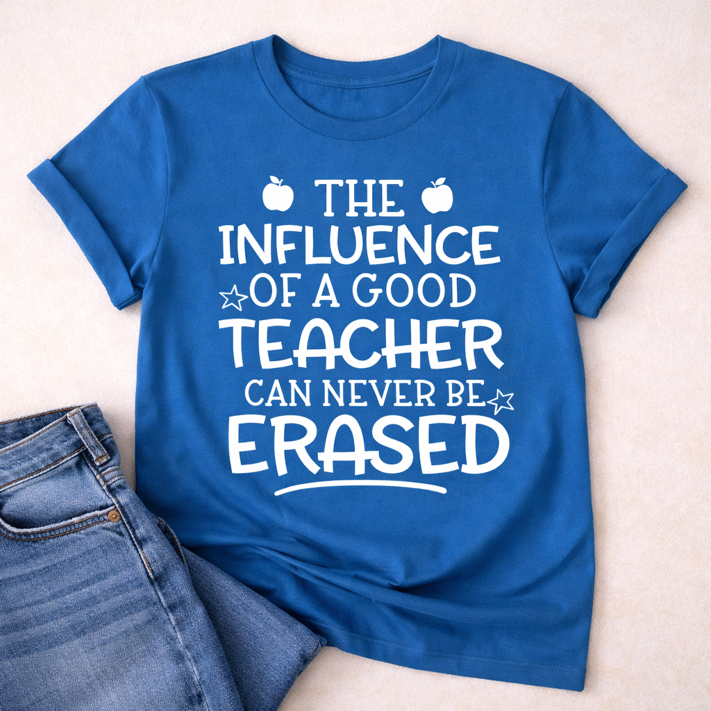 Blue T-shirt with “The Influence of a Good Teacher Can Never Be Erased” SVG design in white, styled flat lay with denim jeans on neutral background – Funny Teacher SVG Quotes