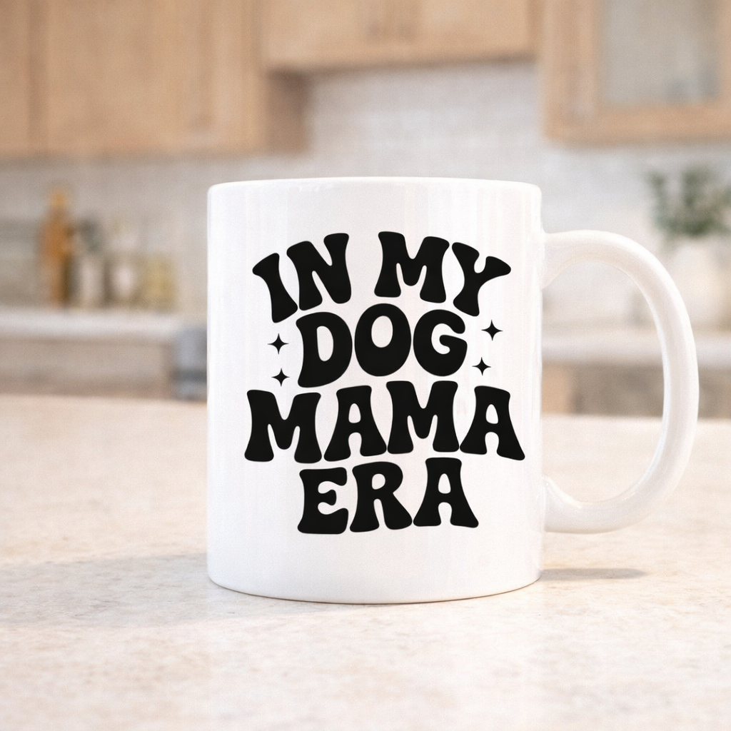 In My Dog Mama Era dog mom SVG quote design on white mug mockup for Cricut and Silhouette crafts