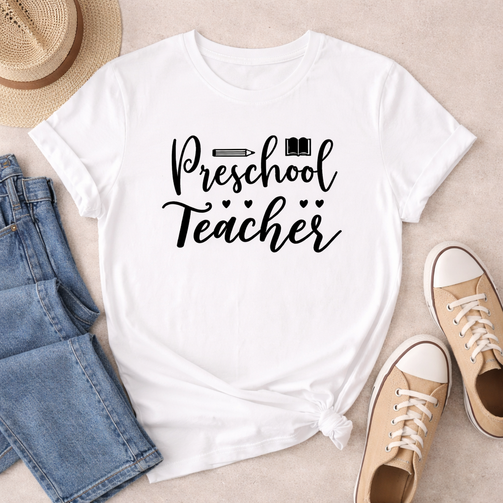 White t-shirt mockup featuring Preschool Teacher SVG with pencil and book icons, styled with jeans and sneakers for casual classroom outfit inspiration
